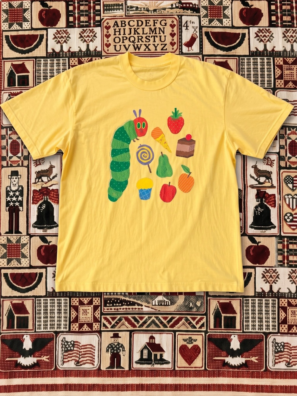Yellow Graphic Tee with Colorful Caterpillar
Motif